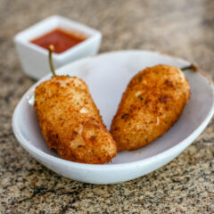 jalapeño peppers deep fried with cheese bacon filling