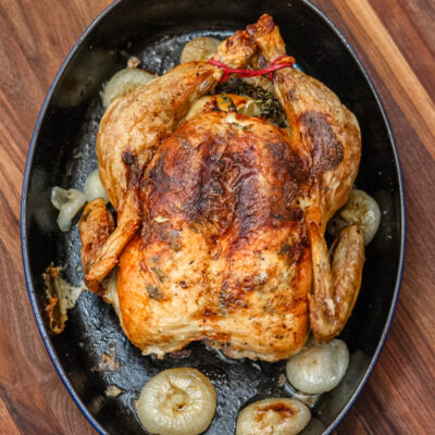 A perfectly roasted Sunday dinner chicken with lemon and herbs