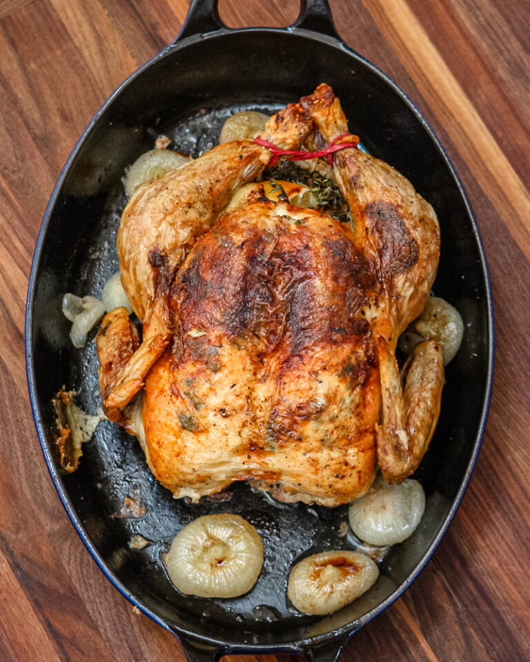 A perfectly roasted Sunday dinner chicken with lemon and herbs