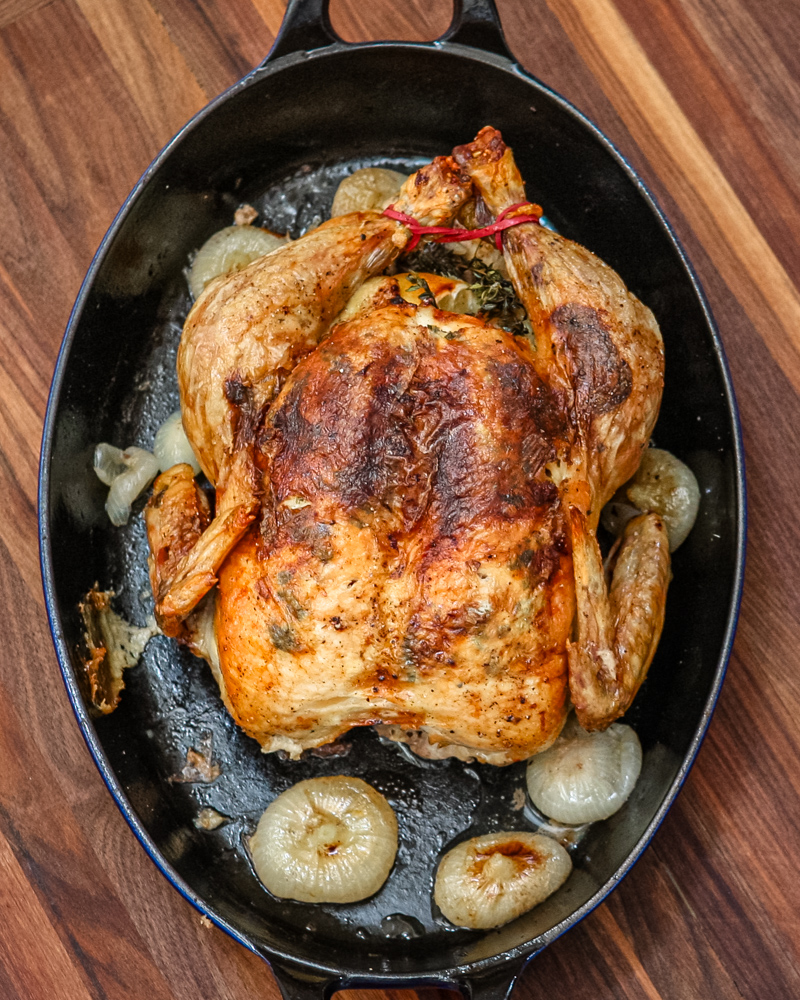 A perfectly roasted Sunday dinner chicken with lemon and herbs