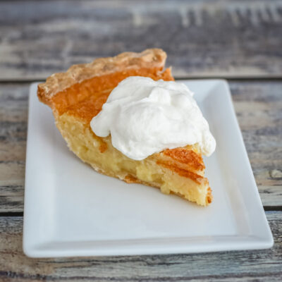 lemon buttermilk pie with whipped cream