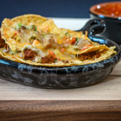 loaded nachos in a luncheon plate