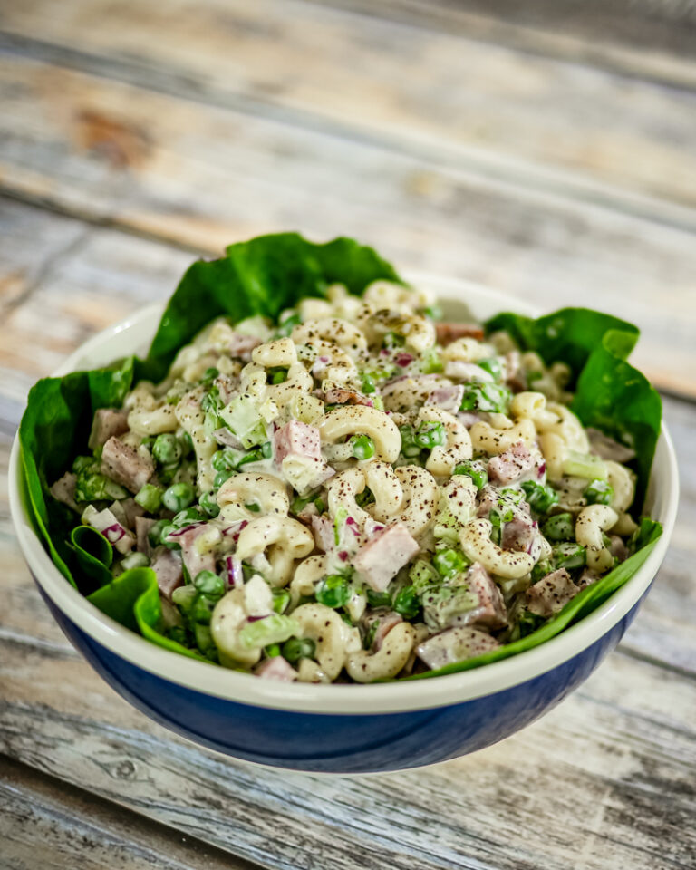 macaroni salad with ham in a serving bowl