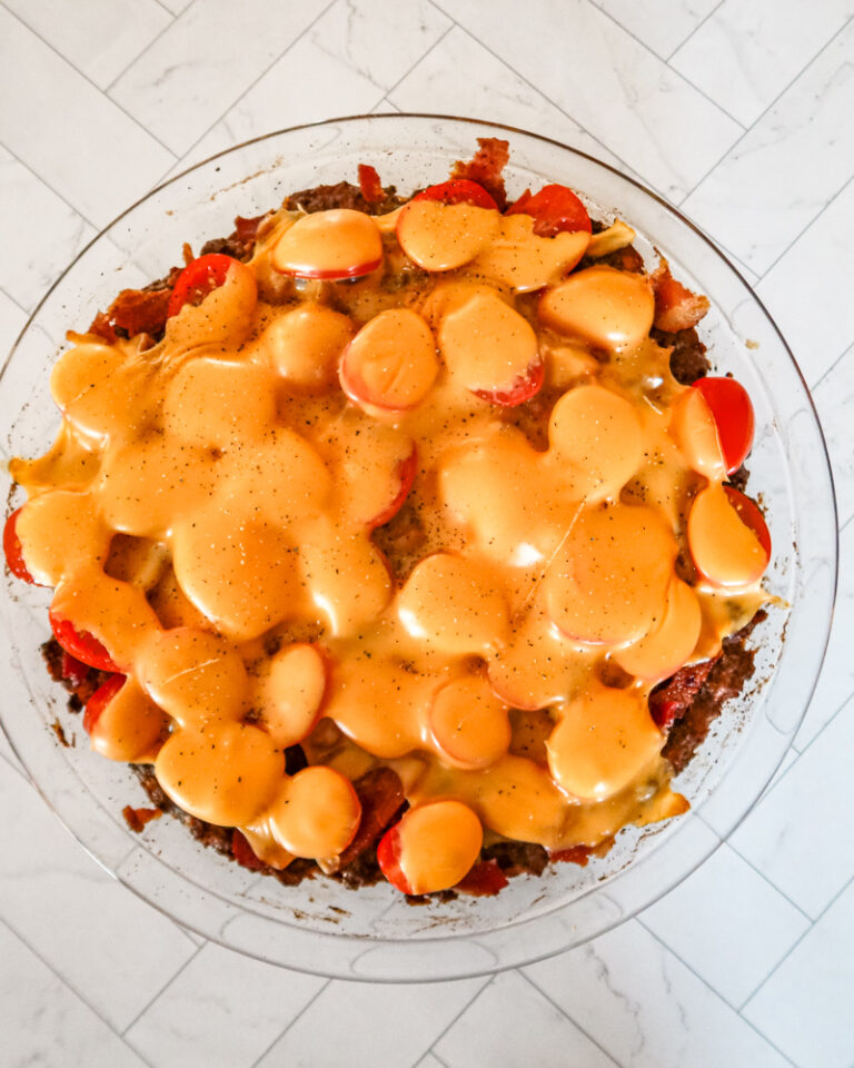 An easy cheeseburger pie in a pie plate, with no crust.