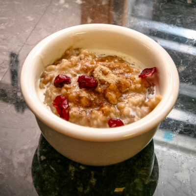 overnight oatmeal in a small bowl with dried cranberries