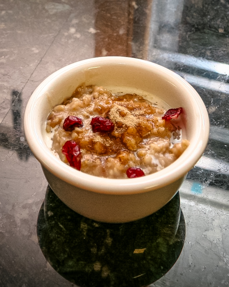overnight oatmeal in a small bowl with dried cranberries
