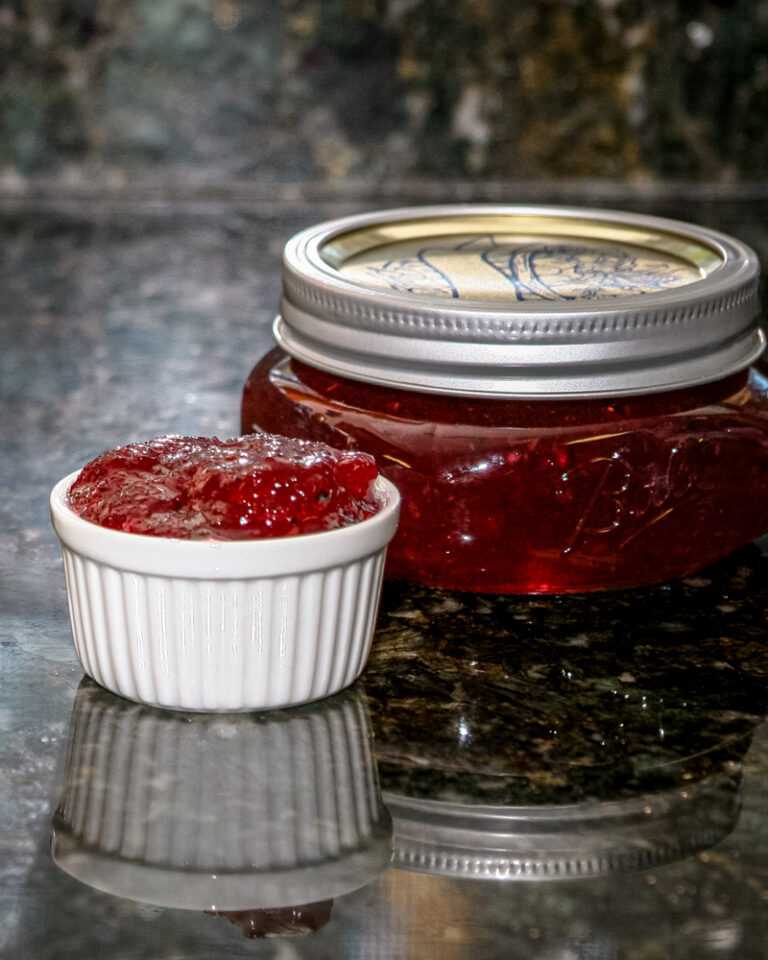 plum and peach jam in a canning jar