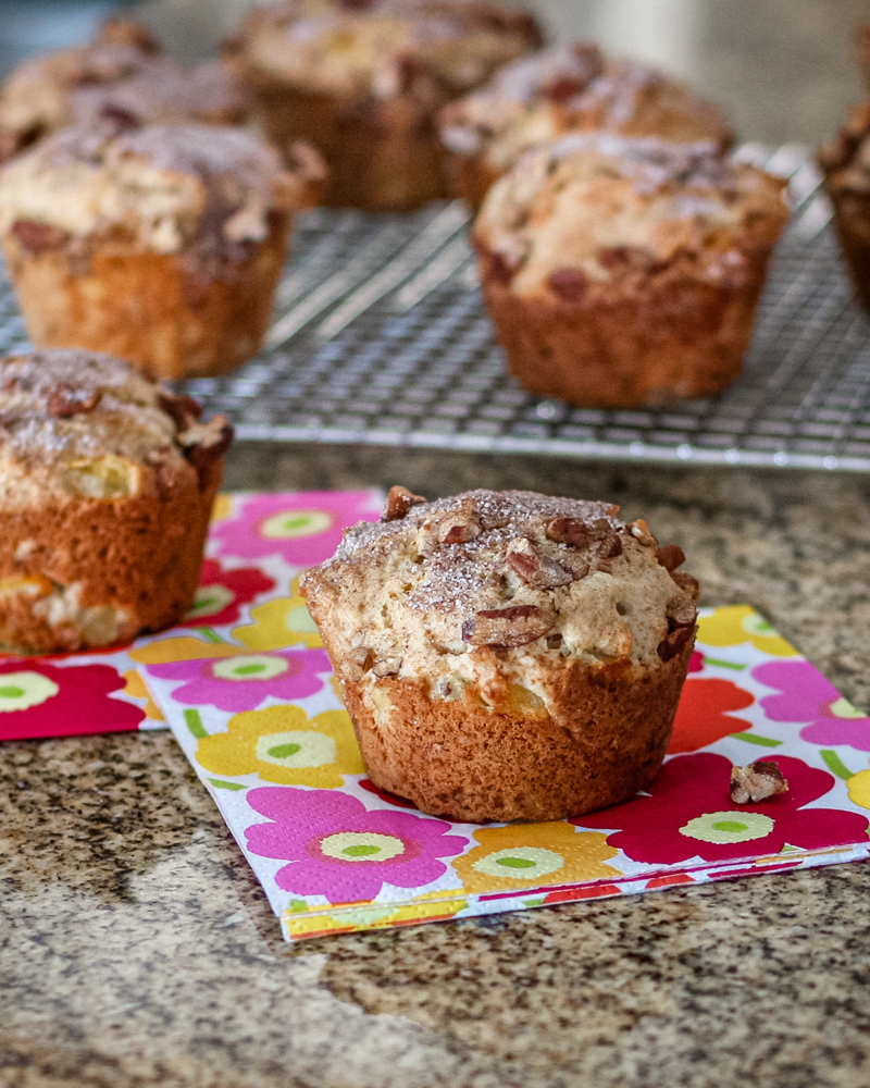pineapple muffins on a cooling rack