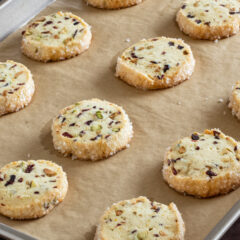 A stack of pistachio cranberry shortbread cookies