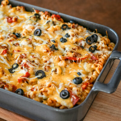 Baked pizza casserole on a cutting board