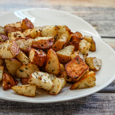 Roasted potatoes on a platter.