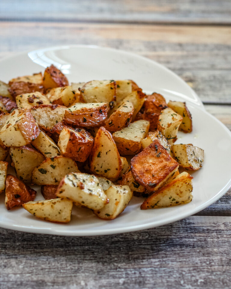 Roasted potatoes on a platter.