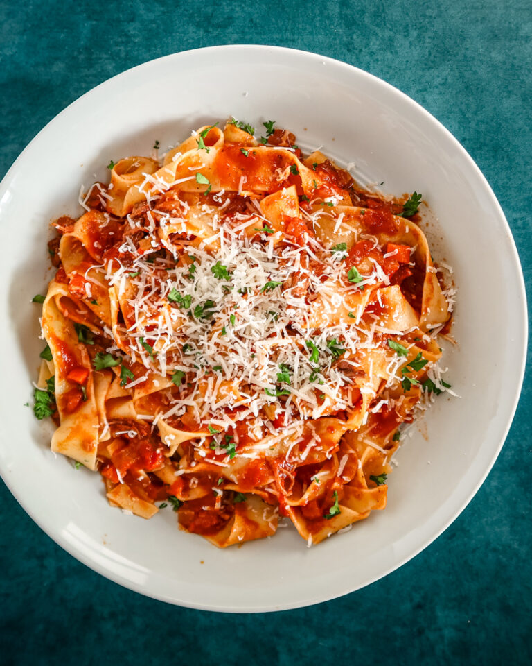Short rib Bolognese sauce with pasta and parmesan