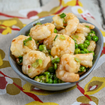 Shrimp with peas in an Asian inspired sweet and sour sauce.