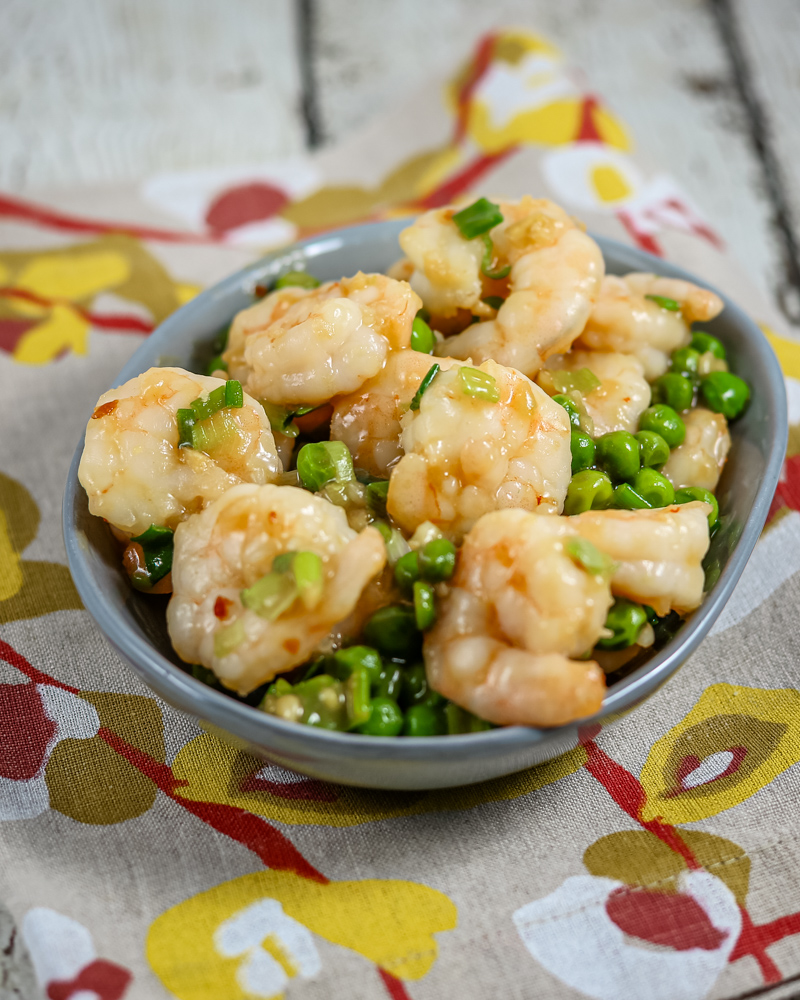 Shrimp with peas in an Asian inspired sweet and sour sauce.
