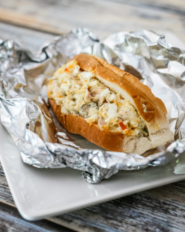 A warm baked tuna bun with chopped egg and mayo.