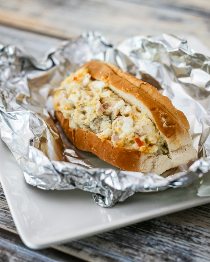 A warm baked tuna bun with chopped egg and mayo.