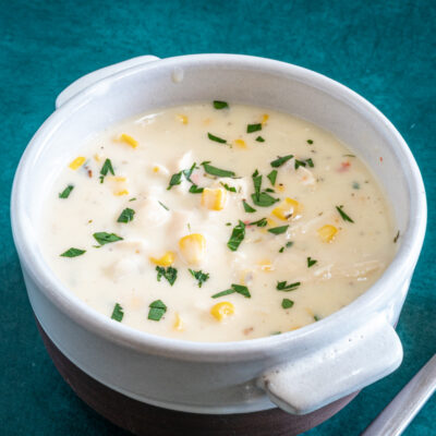 20 minute chicken chowder with corn and parsley garnish in a bowl