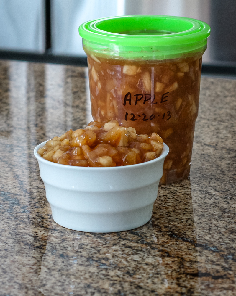 Apple dessert filling in a freezer container.