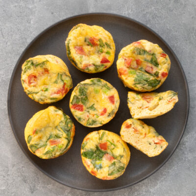 Adaptable egg bites on a dark gray serving plate