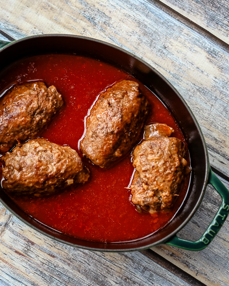German rouladen, beef rolls with pickles, carrots, and bacon.