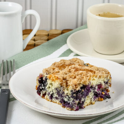 blueberry buckle coffee cake on a plate