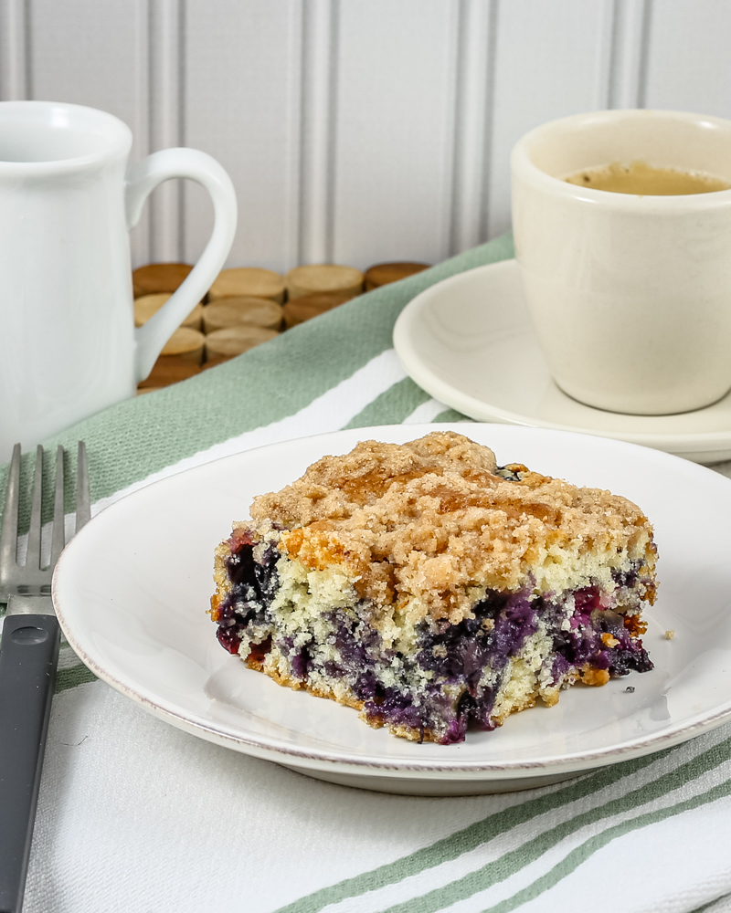 blueberry buckle coffee cake on a plate