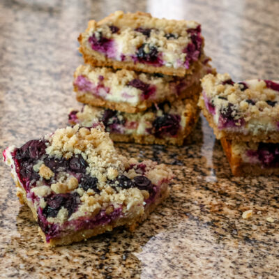 blueberry cheesecake bars stacked