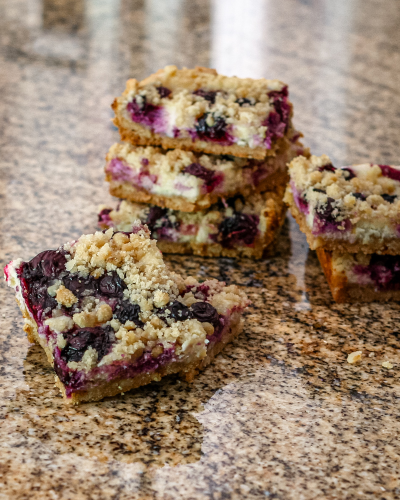 blueberry cheesecake bars stacked