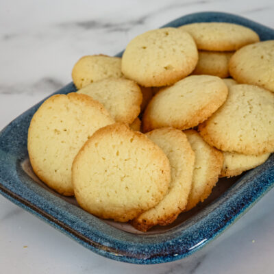 brown edge cookies on a small serving tray