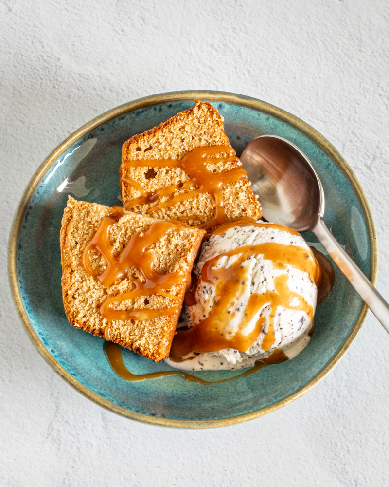 sliced brown sugar pound cake with caramel drizzle
