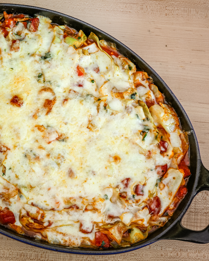 cabbage casserole with sausage in a staub baking dish