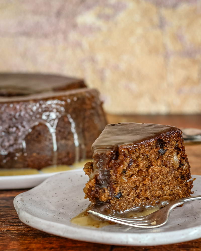 A fig preserves cake with a caramel glaze.