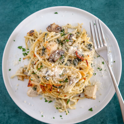 chicken tetrazzini serving on a plate with fork