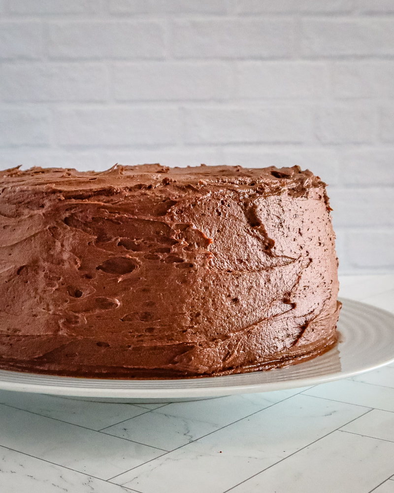 layer cake with chocolate buttercream frosting