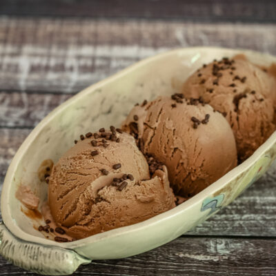 homemade chocolate ice cream in a pottery serving dish.