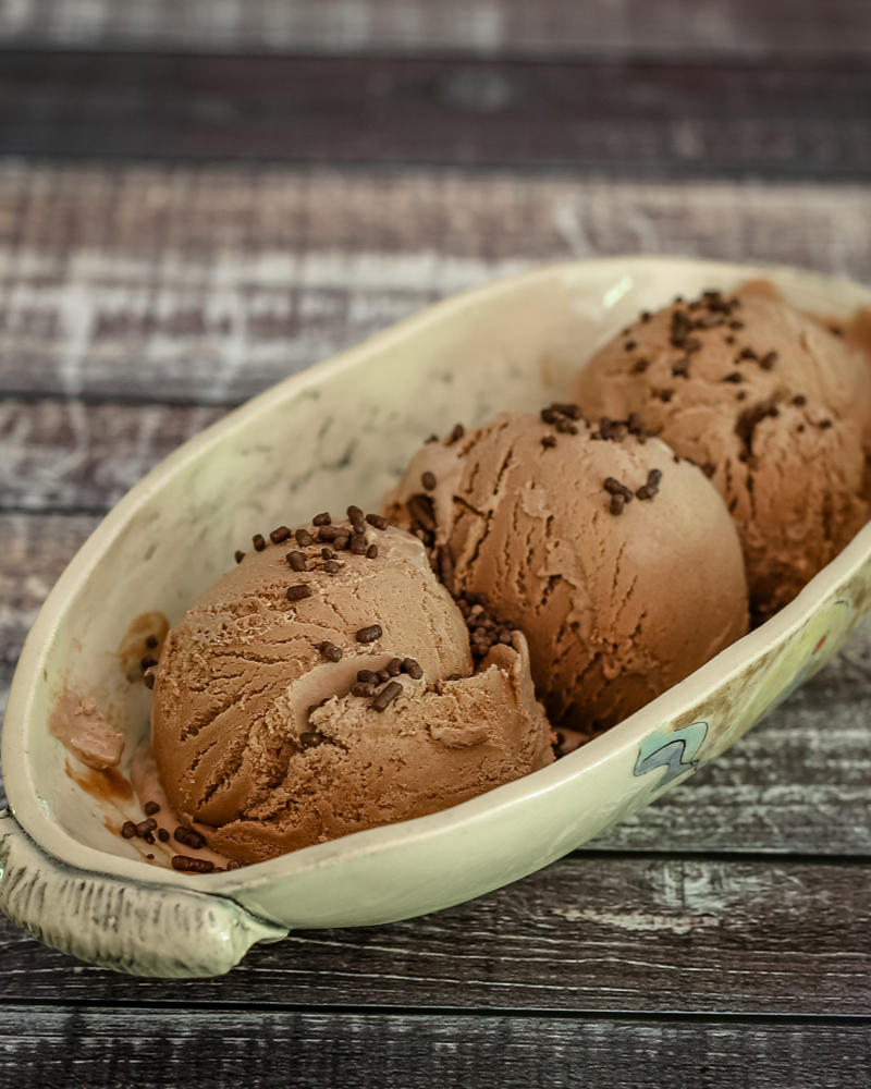 homemade chocolate ice cream in a pottery serving dish.