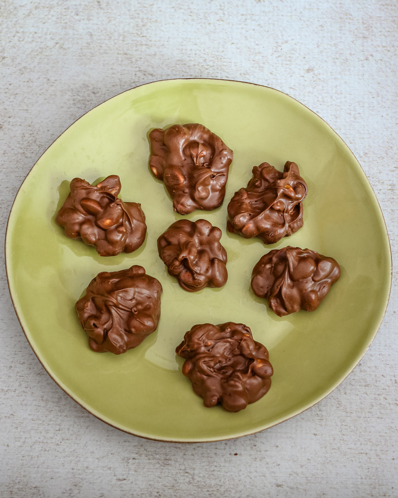 chocolate peanut clusters on a plate