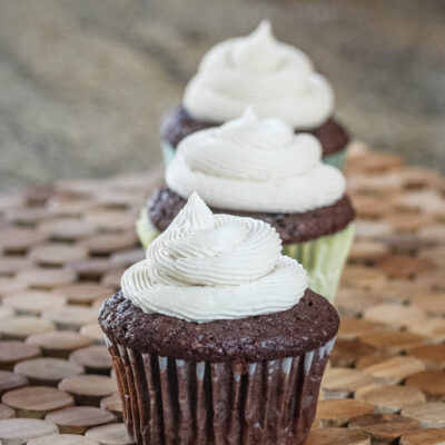 chocolate stout cupcakes on a wood placemat