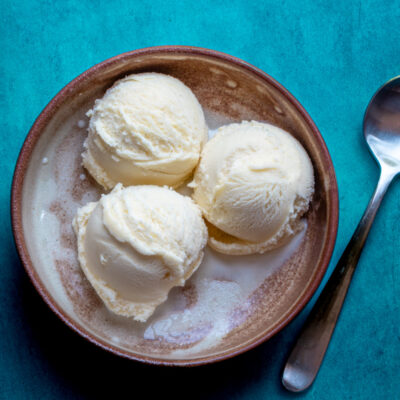 3 scoops of gelato in a bowl with a spoon
