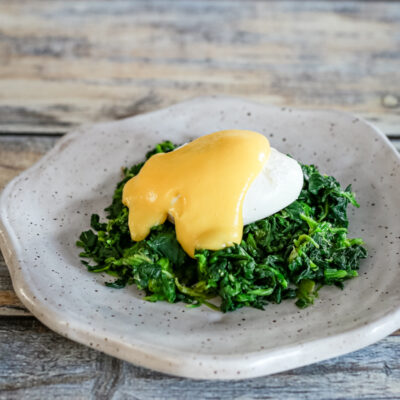 classic hollandaise sauce on a poached egg