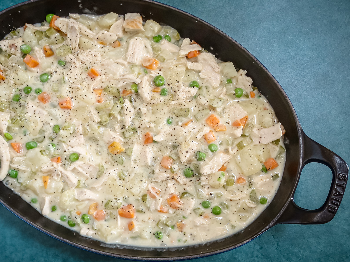 chicken pot pie filling in the baking dish.