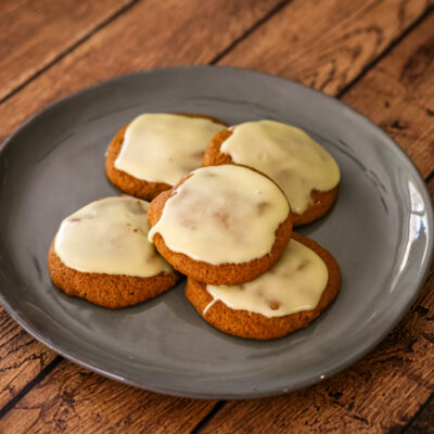 a plate of applesauce cookies with brown butter glaze