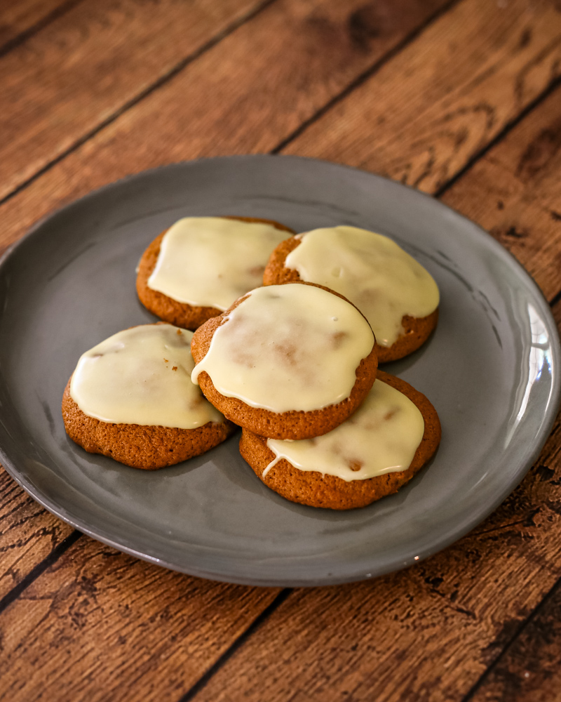 a plate of applesauce cookies with brown butter glaze