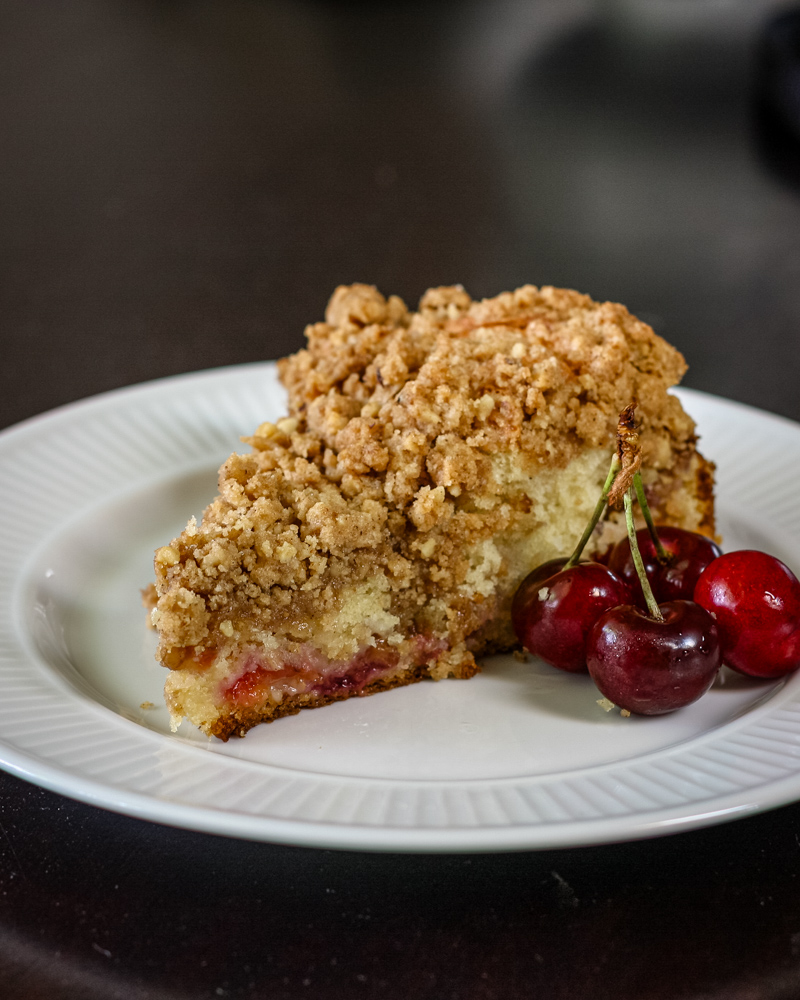 Streusel topping on a cherry crumb cake.