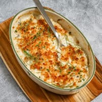A baking dish of savory fennel gratin with crunchy breadcrumb topping.
