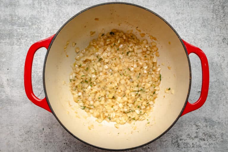 Sautéed onions and herbs in the Dutch oven, for Yankee pot roast prep.