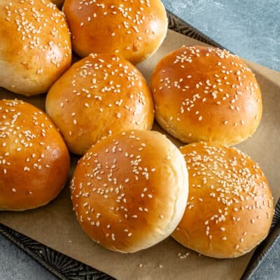 Homemade potato hamburger buns with sesame seed topping.