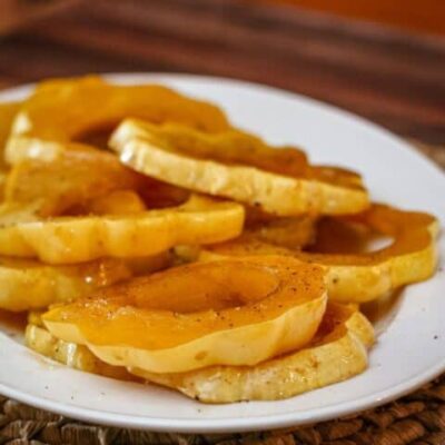 glazed acorn squash rings on a platter