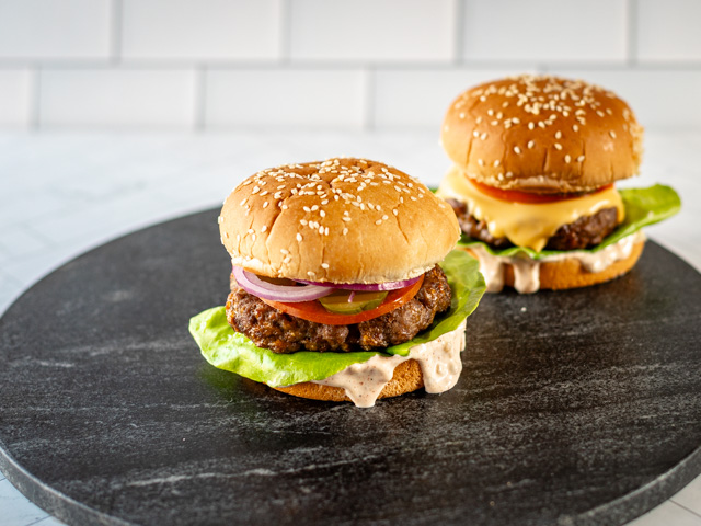 air fryer burgers in buns with toppings and condiments